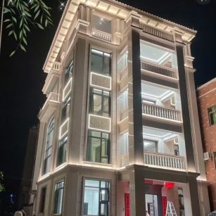 张掖 芝麻白花岗岩别墅外墙夜间效果