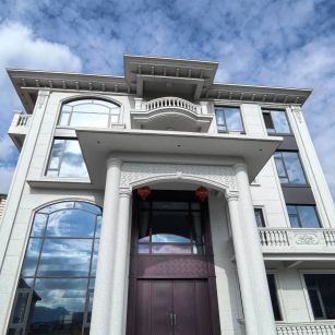 张掖白麻别墅外墙干挂石材效果示例