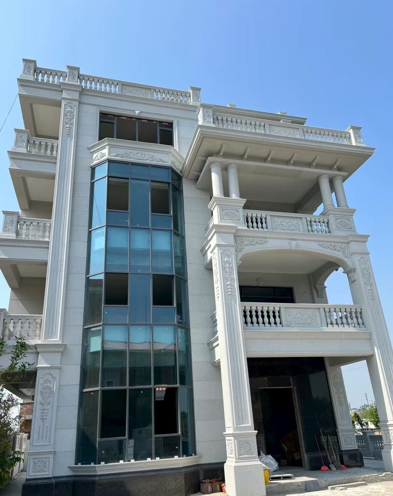 张掖 白麻花岗岩别墅外墙干挂效果展示