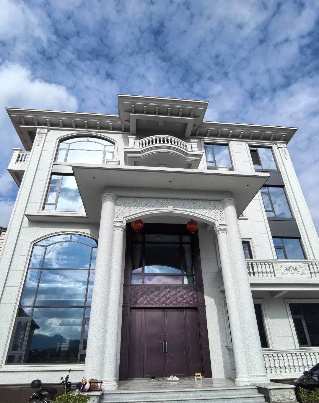 张掖白麻别墅外墙干挂石材效果示例