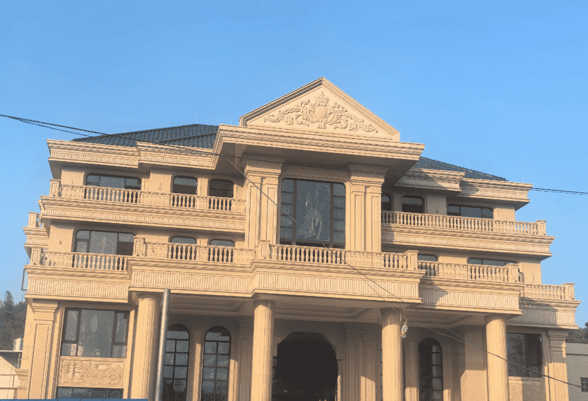 张掖黄金麻别墅外墙干挂石材效果示例