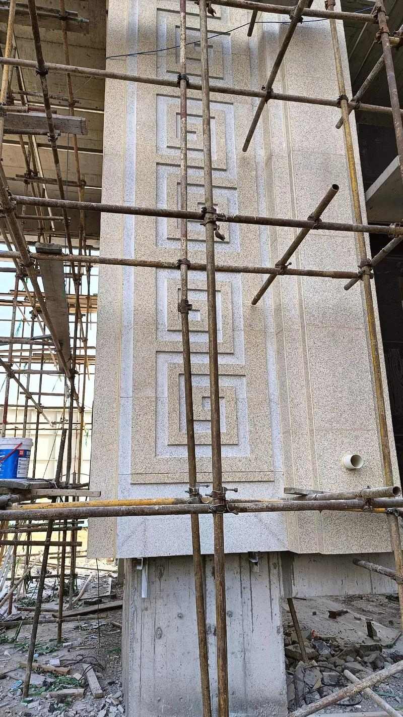 张掖 黄金麻花岗岩别墅外墙干挂回纹造型效果